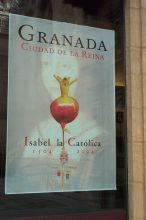 Poster in window celebrating the 500th anniversary year of the death of Queen Isabel.  (Note the Granada)